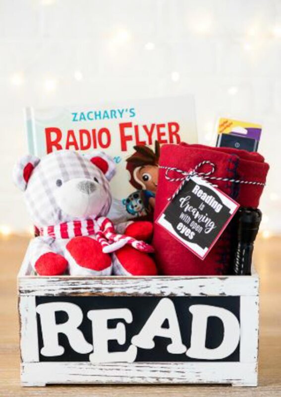 wooden box with book and stuffed animal