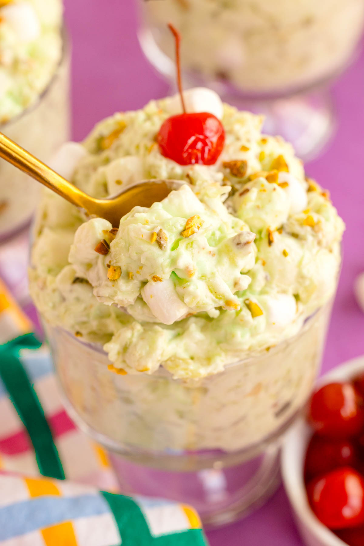 spoon in a dish of watergate salad