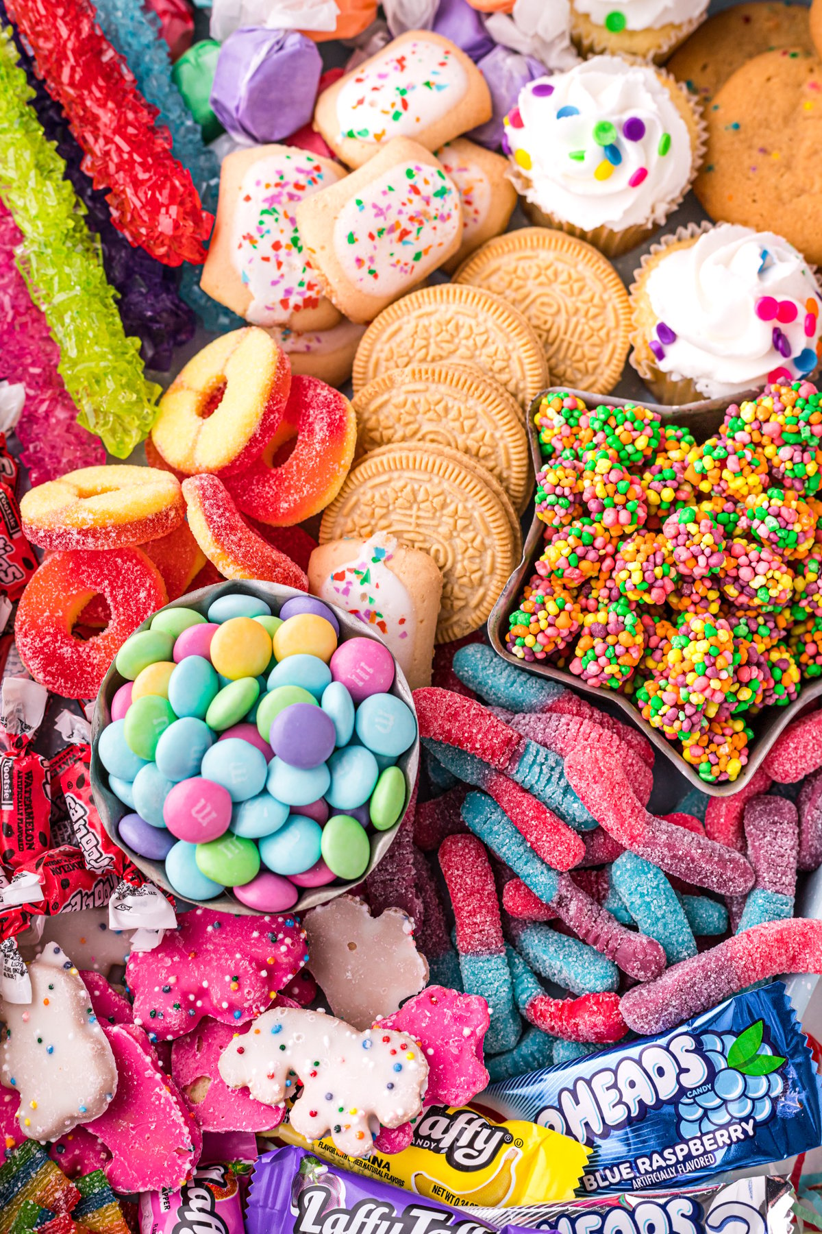 close up view of a colorful birthday dessert board