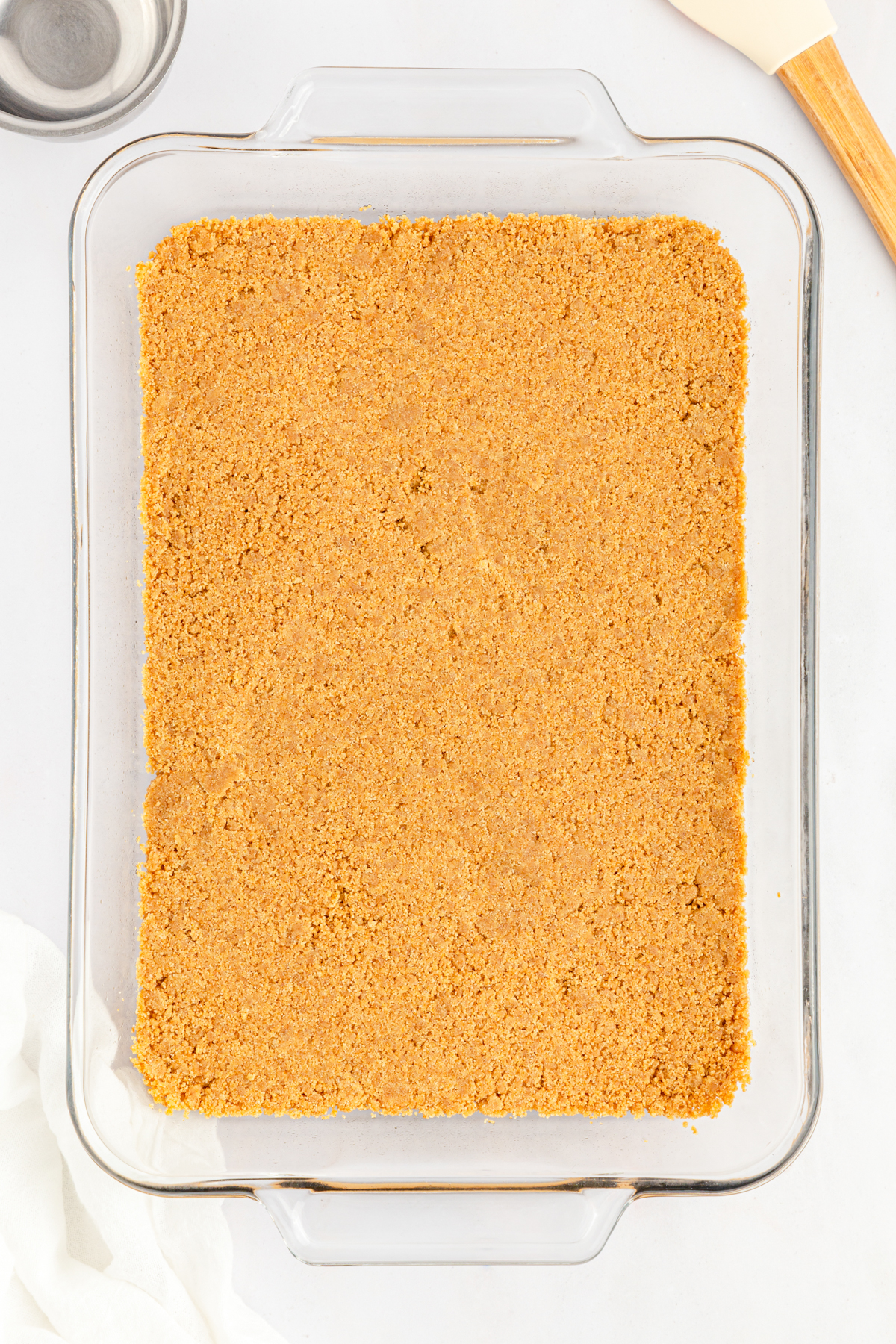 graham cracker crust in a baking pan