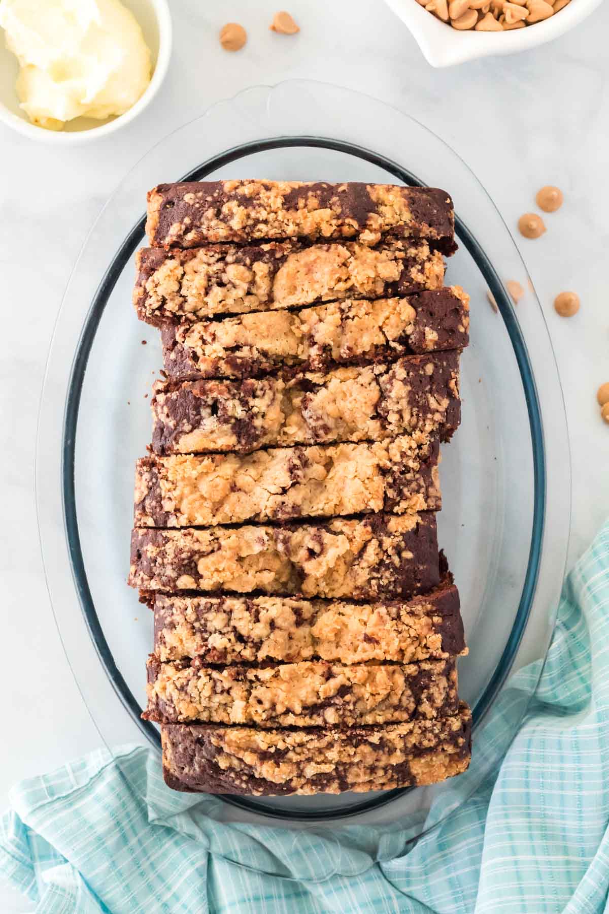 glass plate with sliced peanut butter banana bread