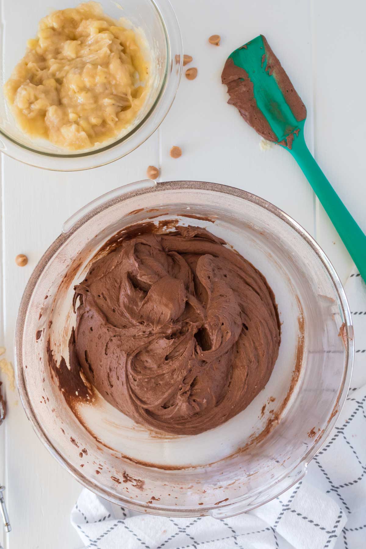 glass bowl with chocolate banana bread batter