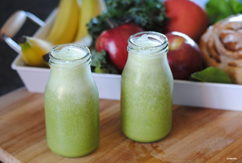 two bottles of green milk