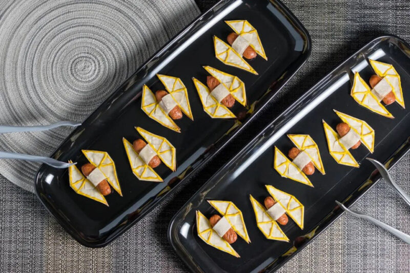 hot dogs wrapped up to look like star wars ships