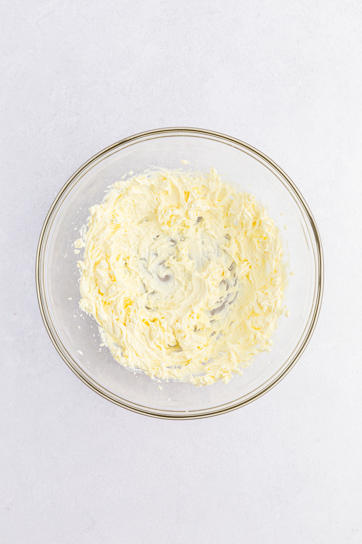 smooth cream cheese in a glass bowl