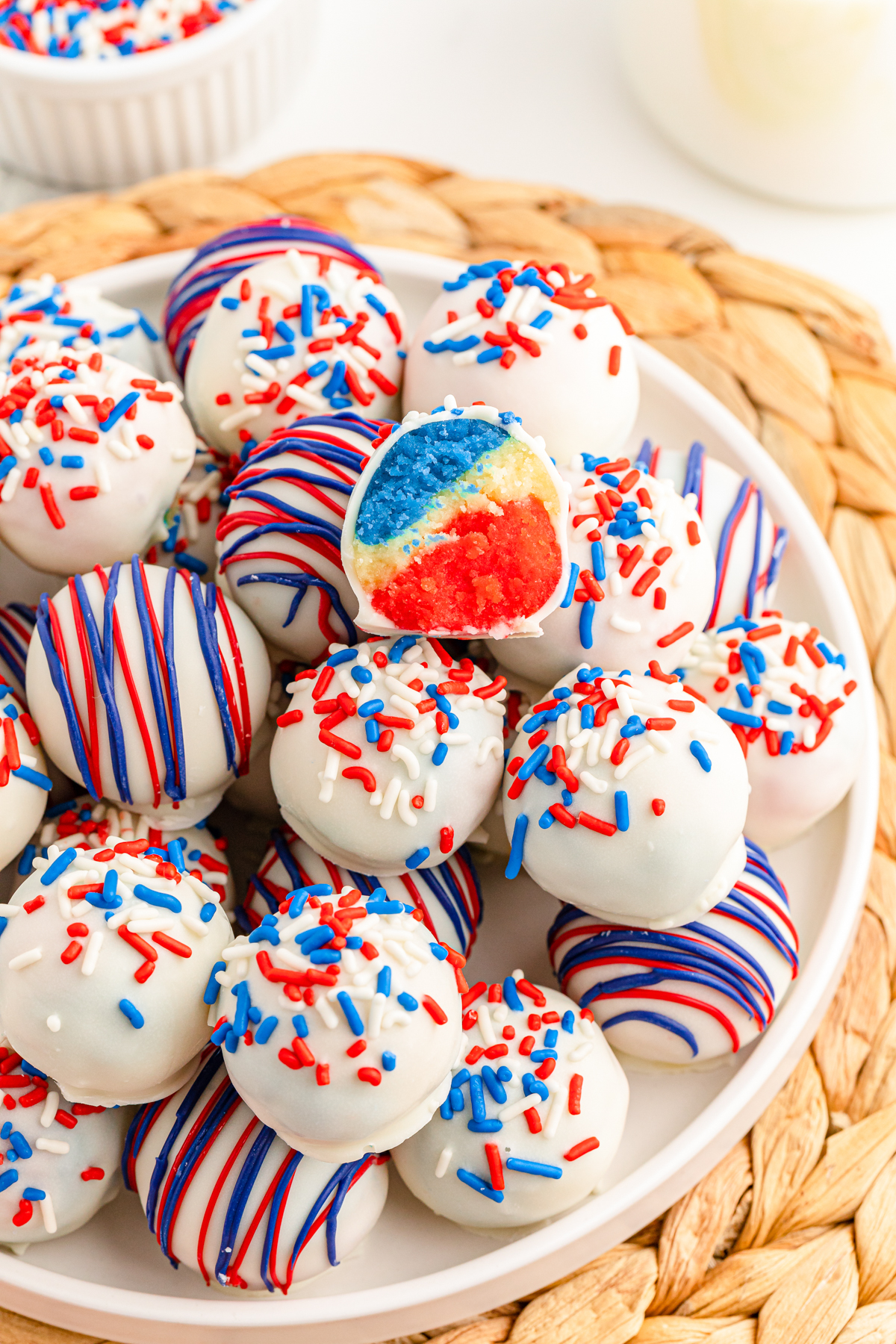 white plate with 4th of July cake balls