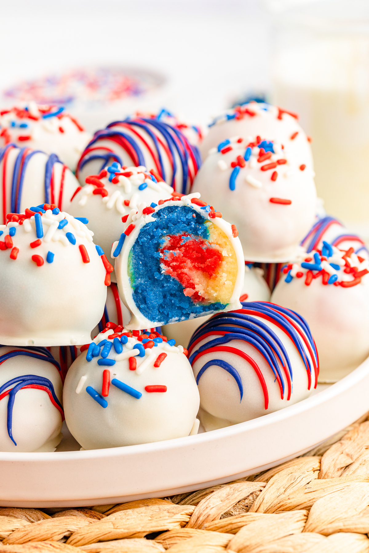 white plate with patriotic 4th of July cake balls