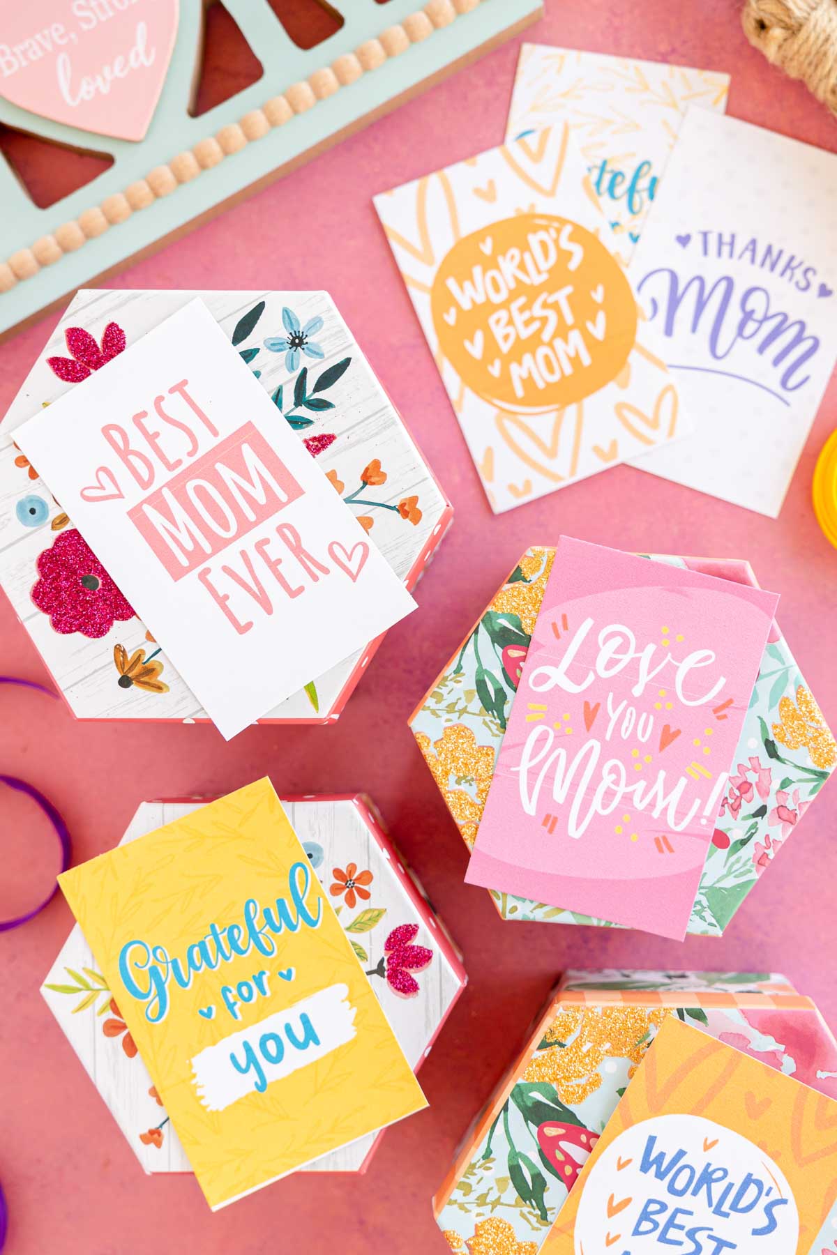 floral boxes with Mother's Day gift tags on them