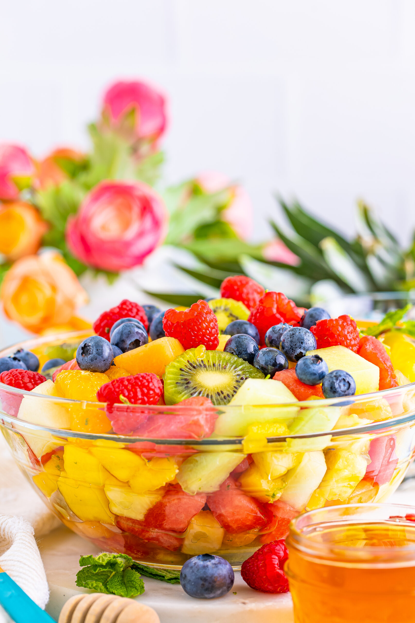 glass bowl filled with tropical fruit salad
