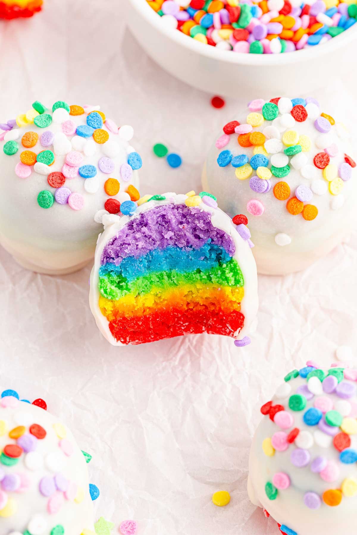 rainbow cake ball showing layers of rainbow cake inside