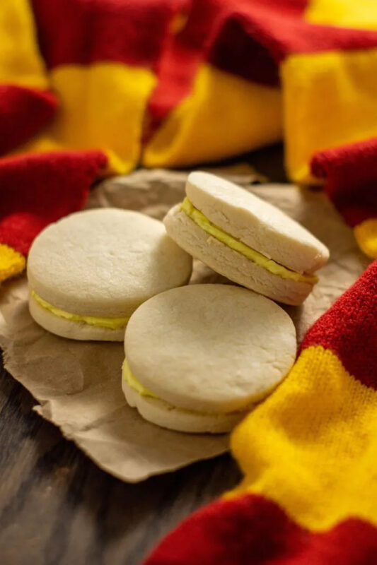 white shortbread cookie with yellow filling