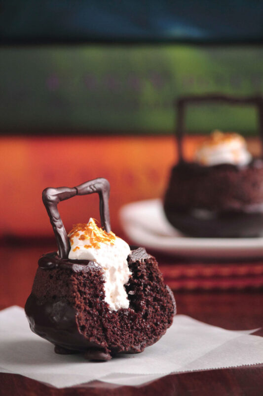 chocolate cupcakes decorated to look like a cauldron