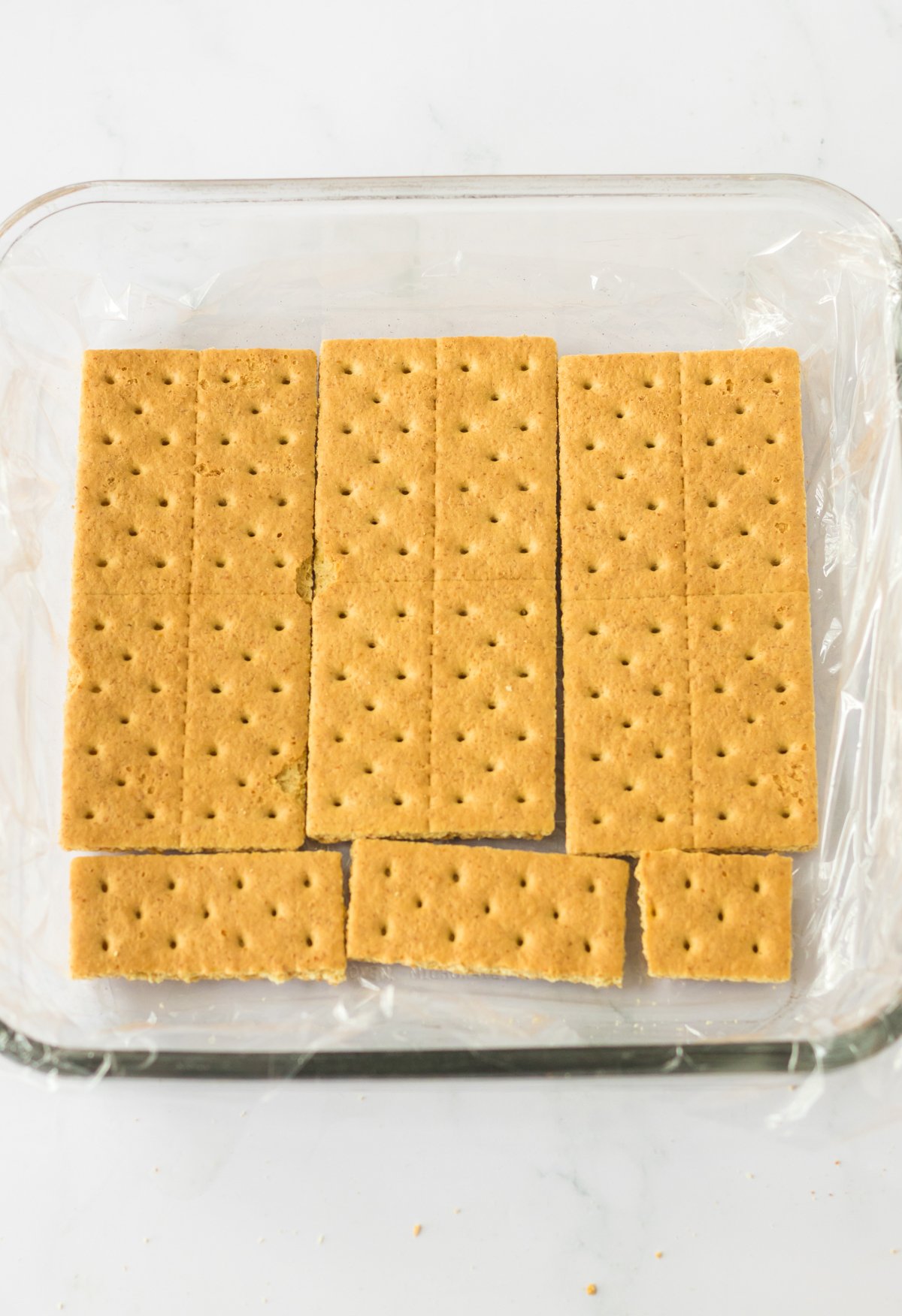 graham crackers in a square baking dish
