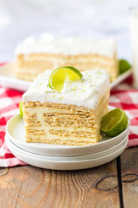 slice of key lime icebox cake on two white plates