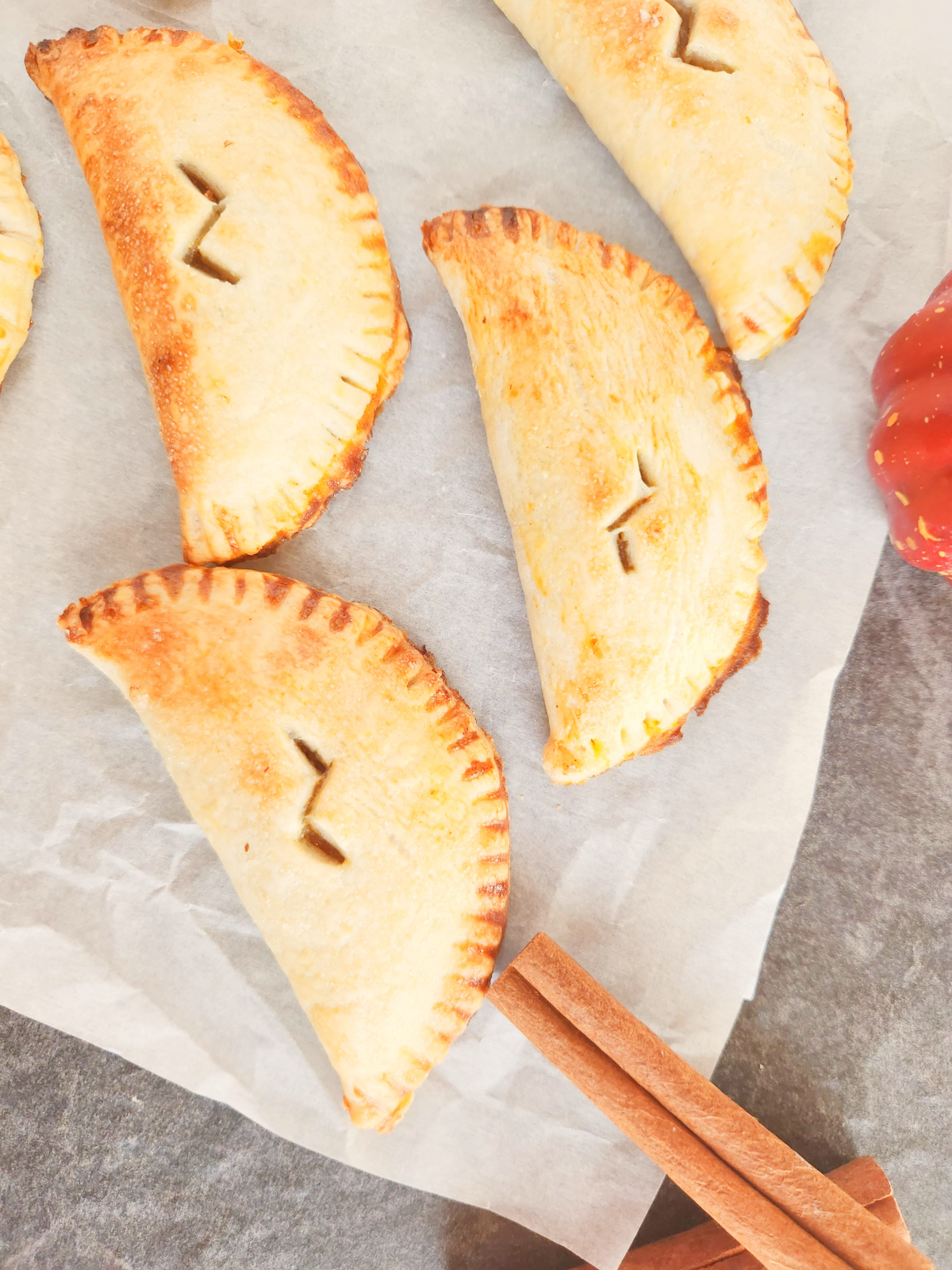 piece of parchment paper with pumpkin pasties