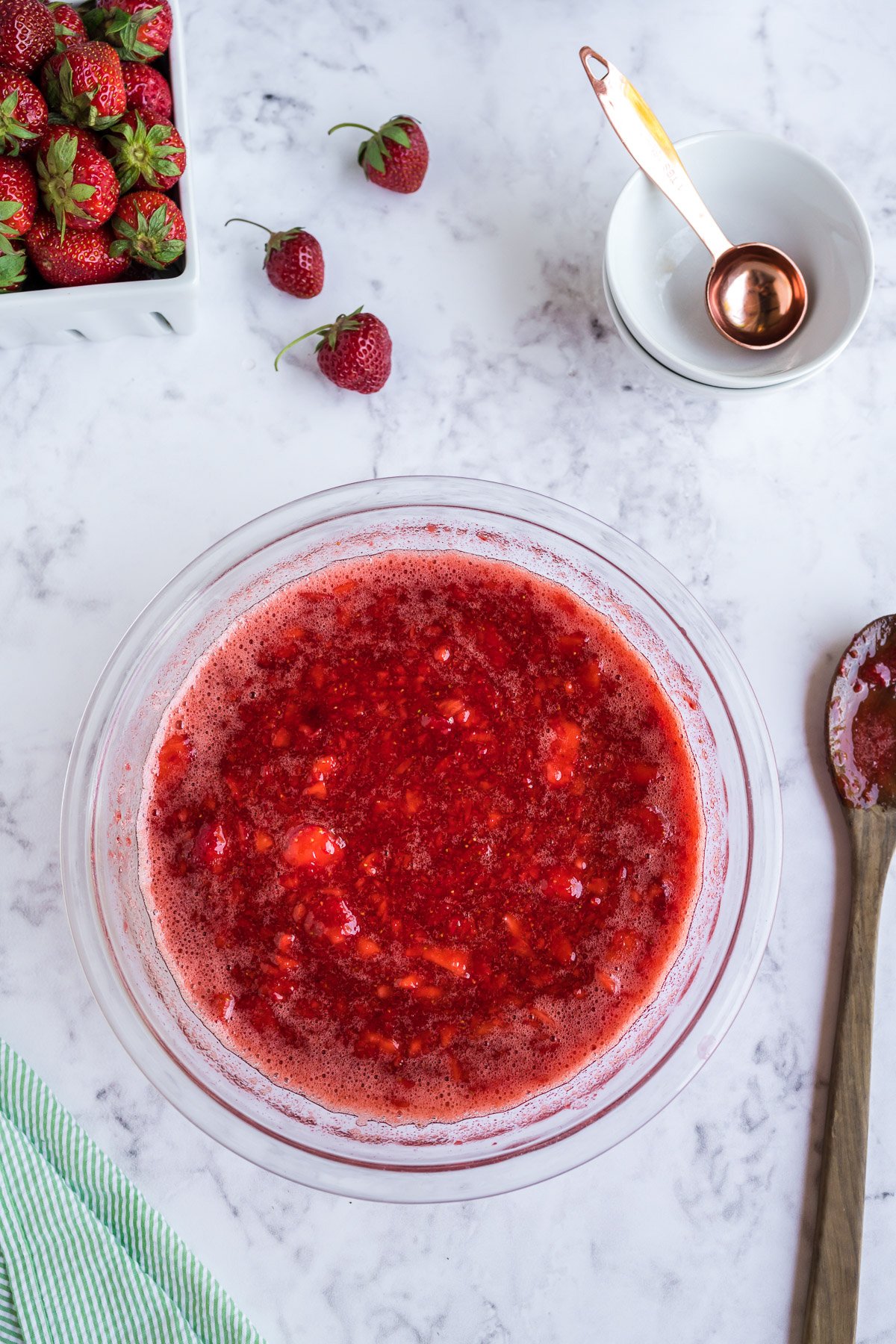 glass bowl with strawberry freezer jam