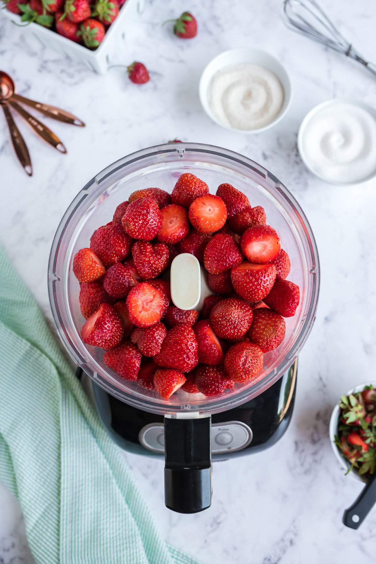 fresh strawberries in a food processor