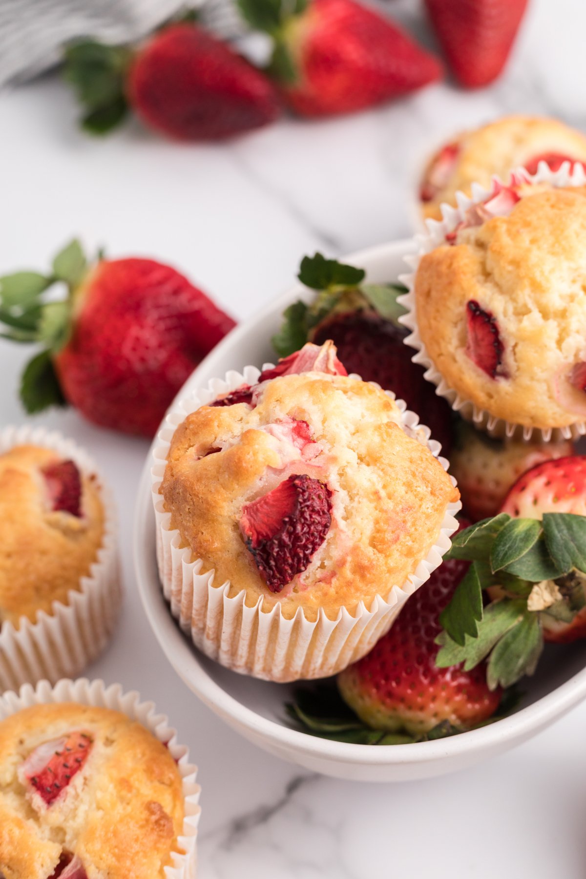 bowl of strawberry muffins