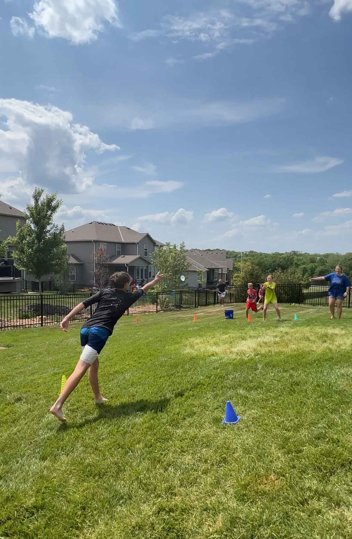 kid throwing a balloon from far away