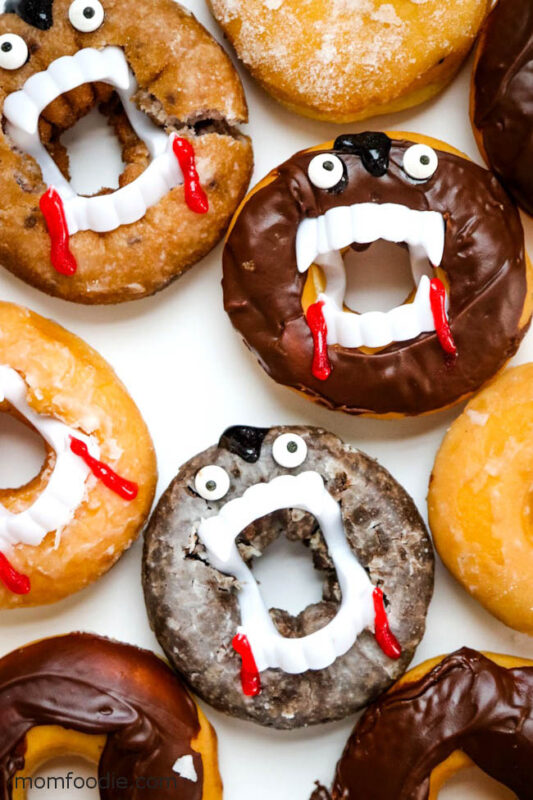 donuts with vampire teeth and red icing drips
