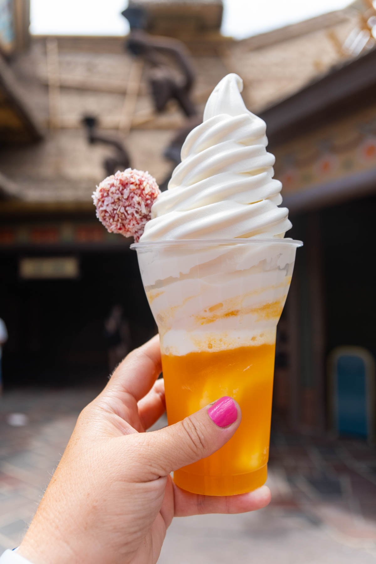 hand holding a tropical serenade at Disney World