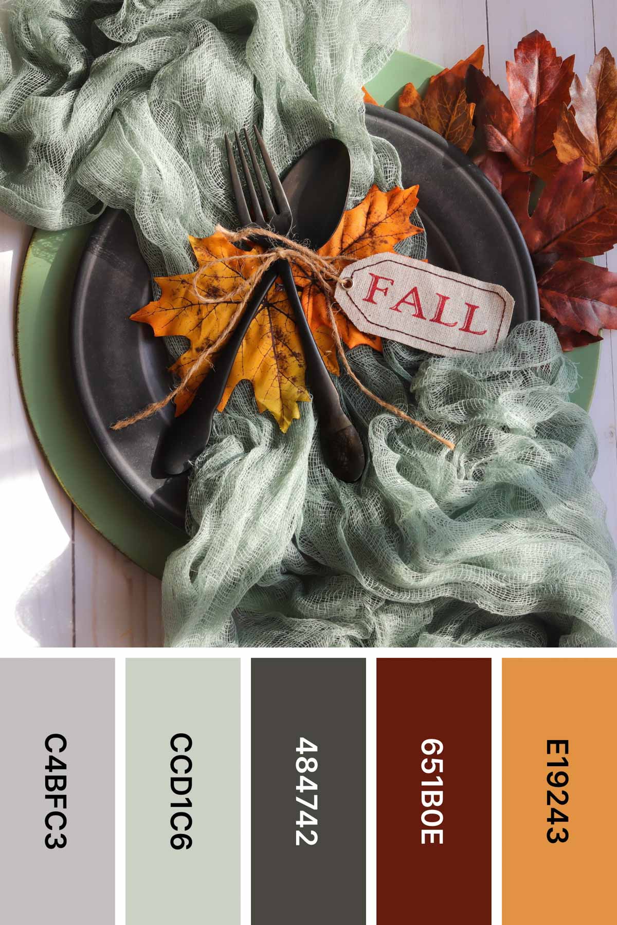 charger with silverware and a fall sign with a fall color palette 