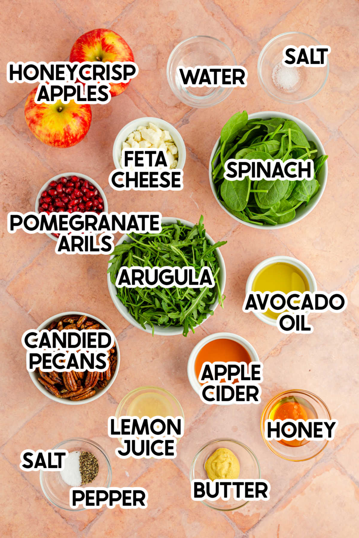 ingredients in a pomegranate feta salad with labels