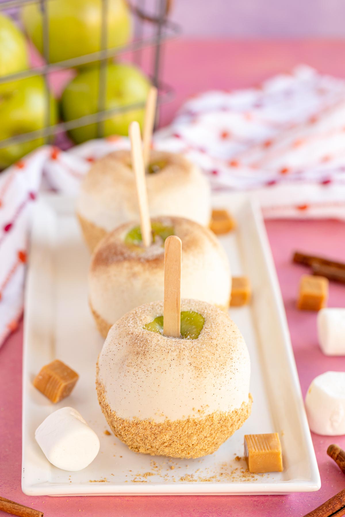white plate with apple pie caramel apples