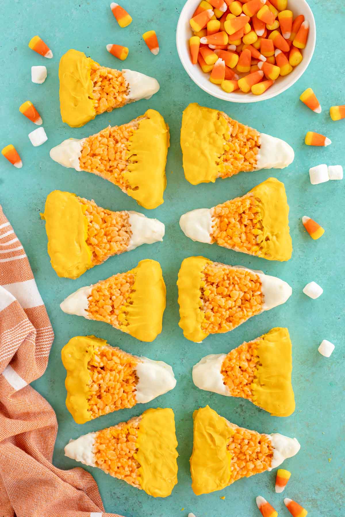 candy corn rice krispies on a blue background