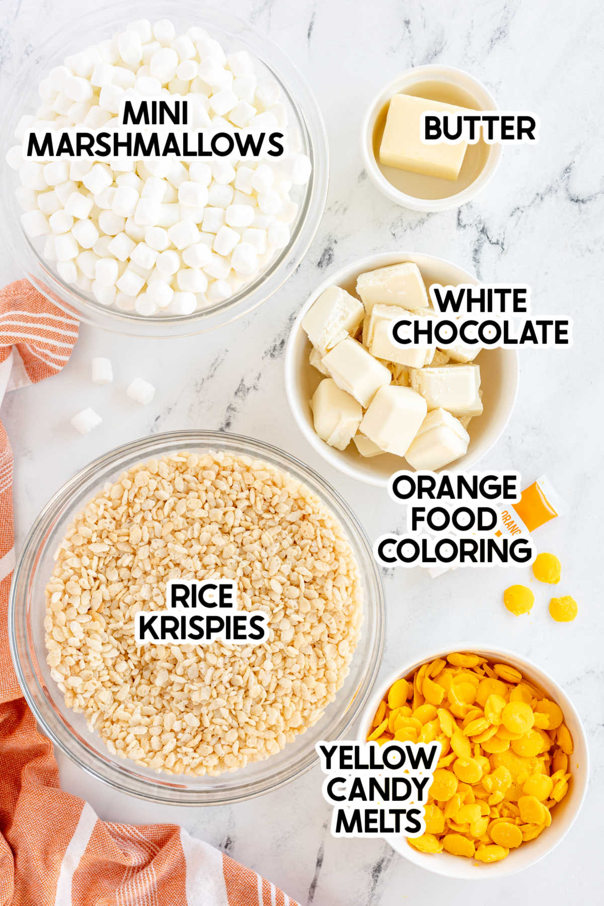 ingredients to make candy corn rice krispy treats with labels