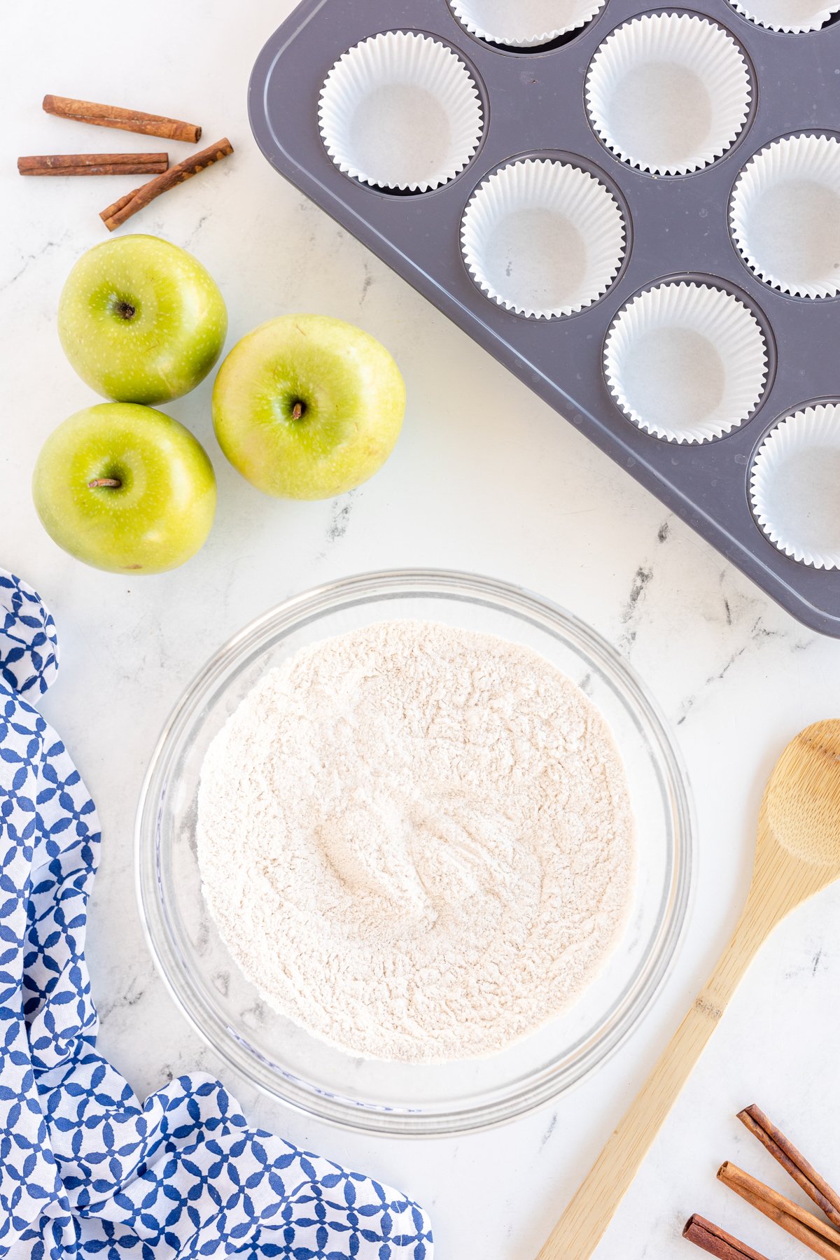 dry ingredients for caramel apple cupcakes in a bowl