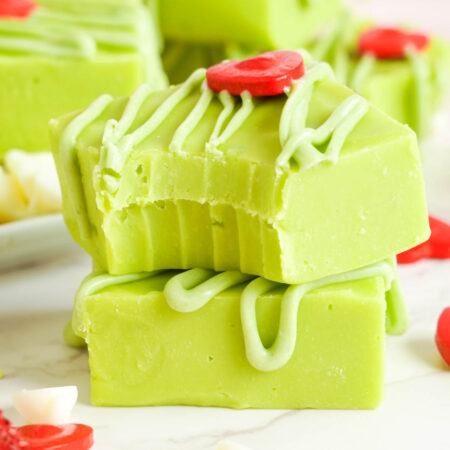 two pieces of stacked Grinch fudge