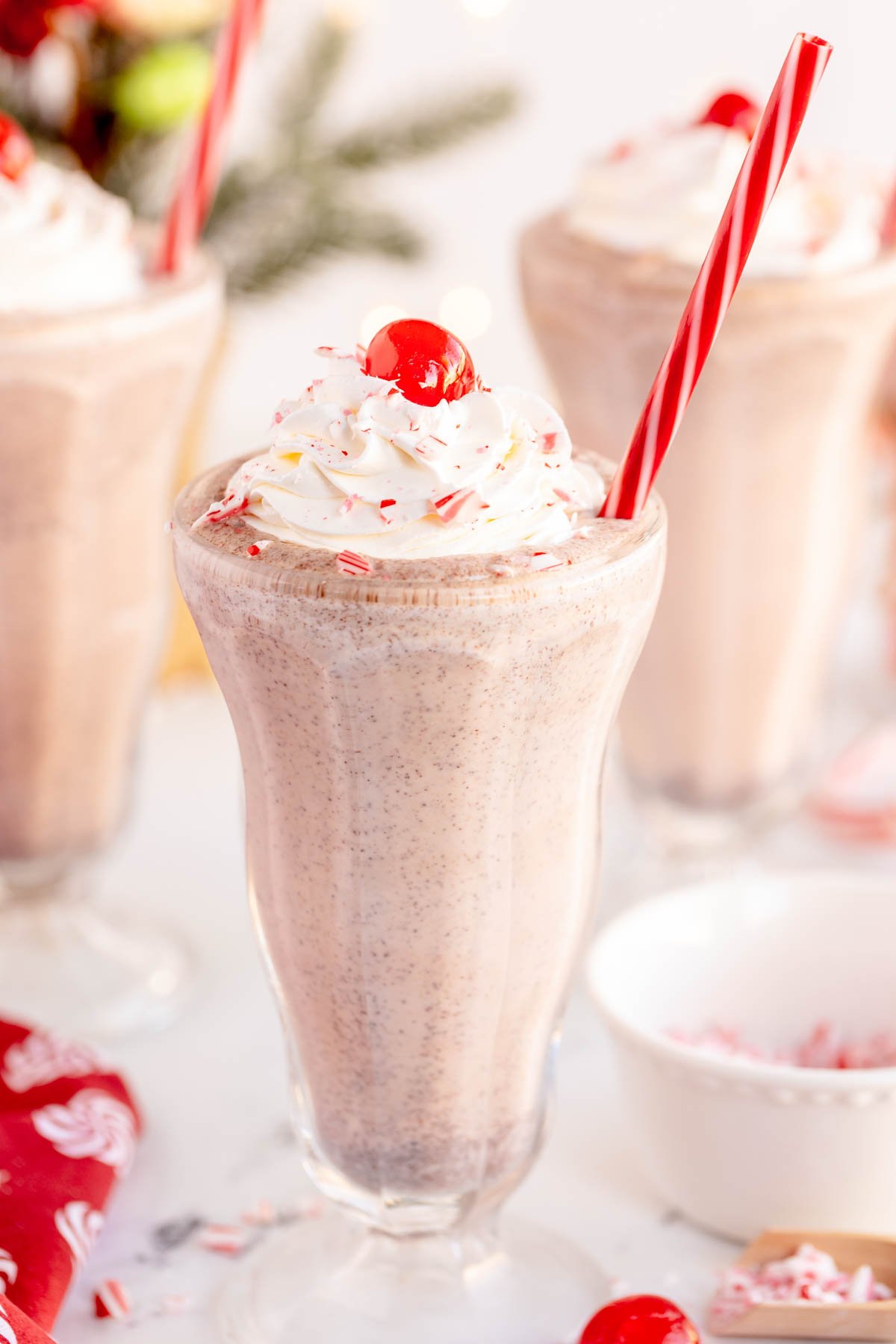 chick fil a peppermint milkshake in a glass