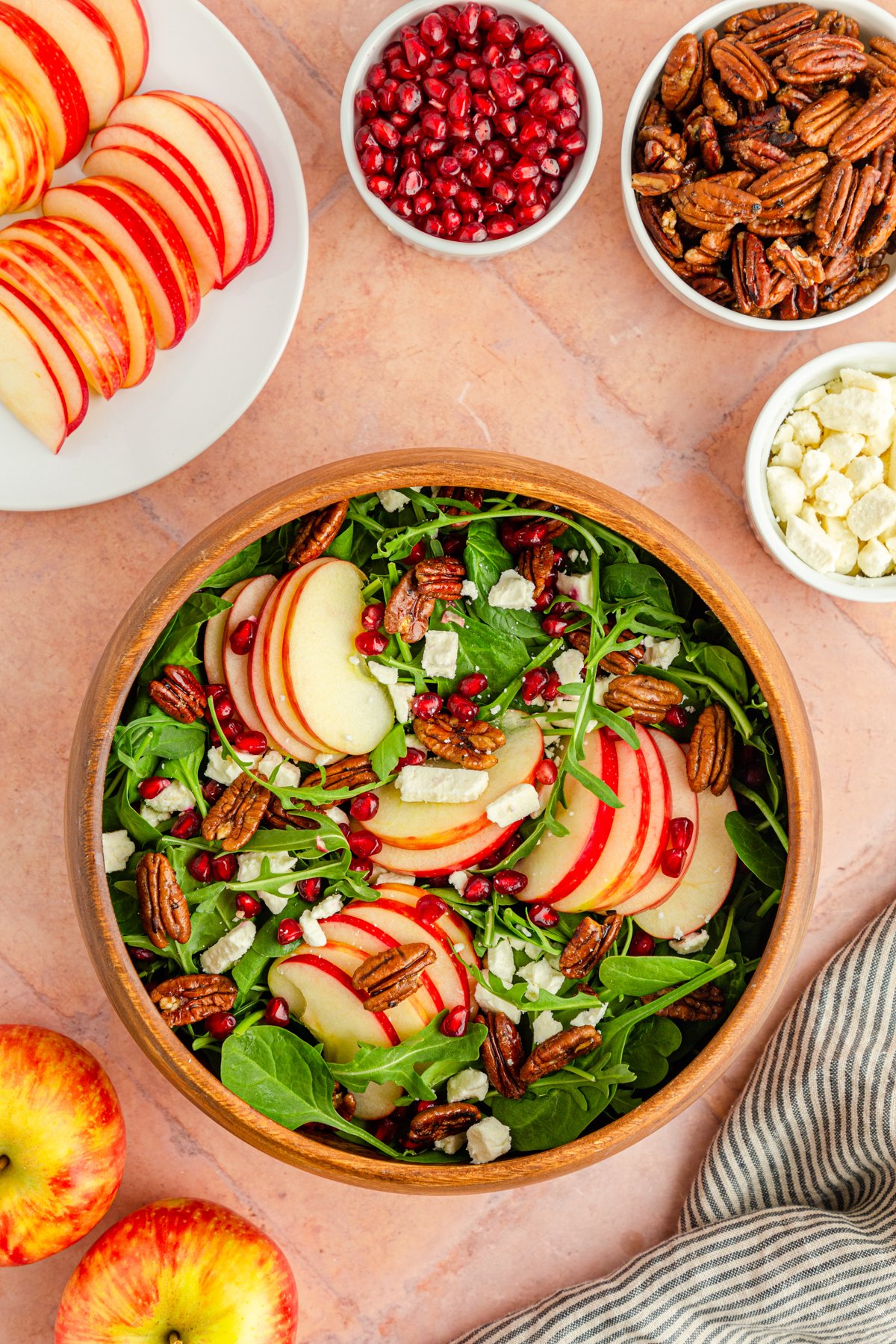 pomegranate feta salad in a brown bowl