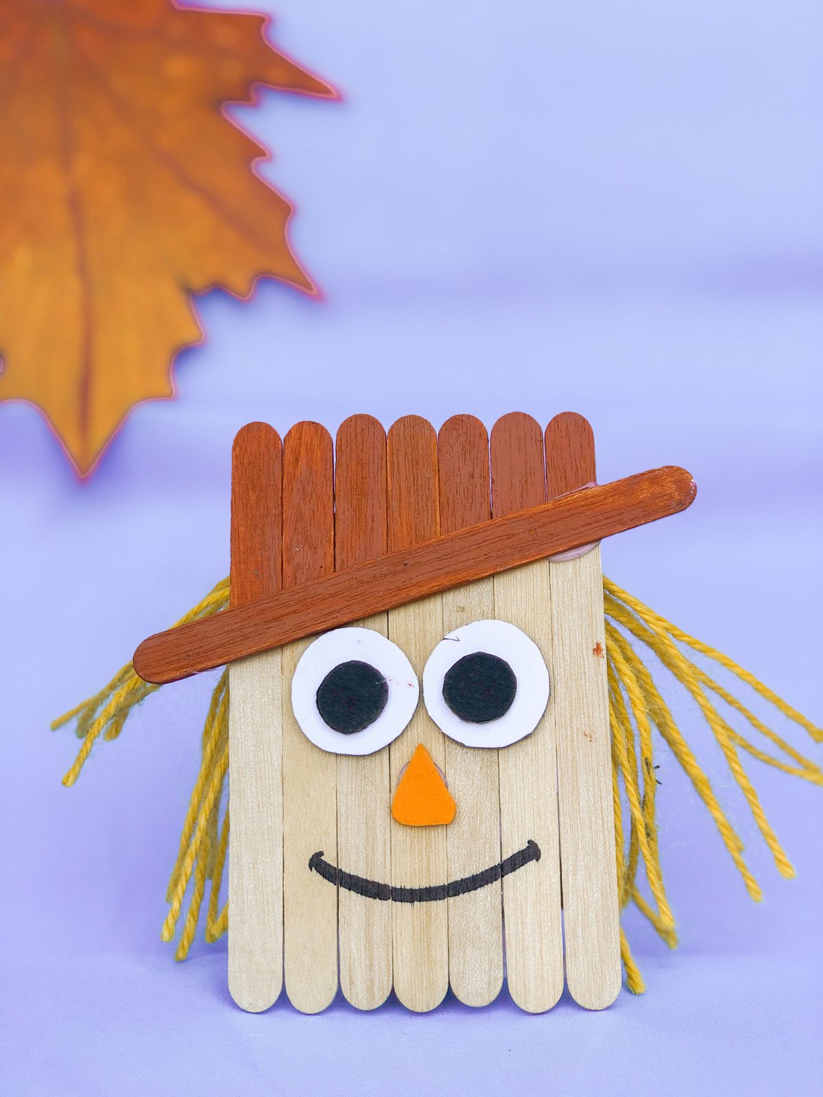 scarecrow face made out of popsicle sticks