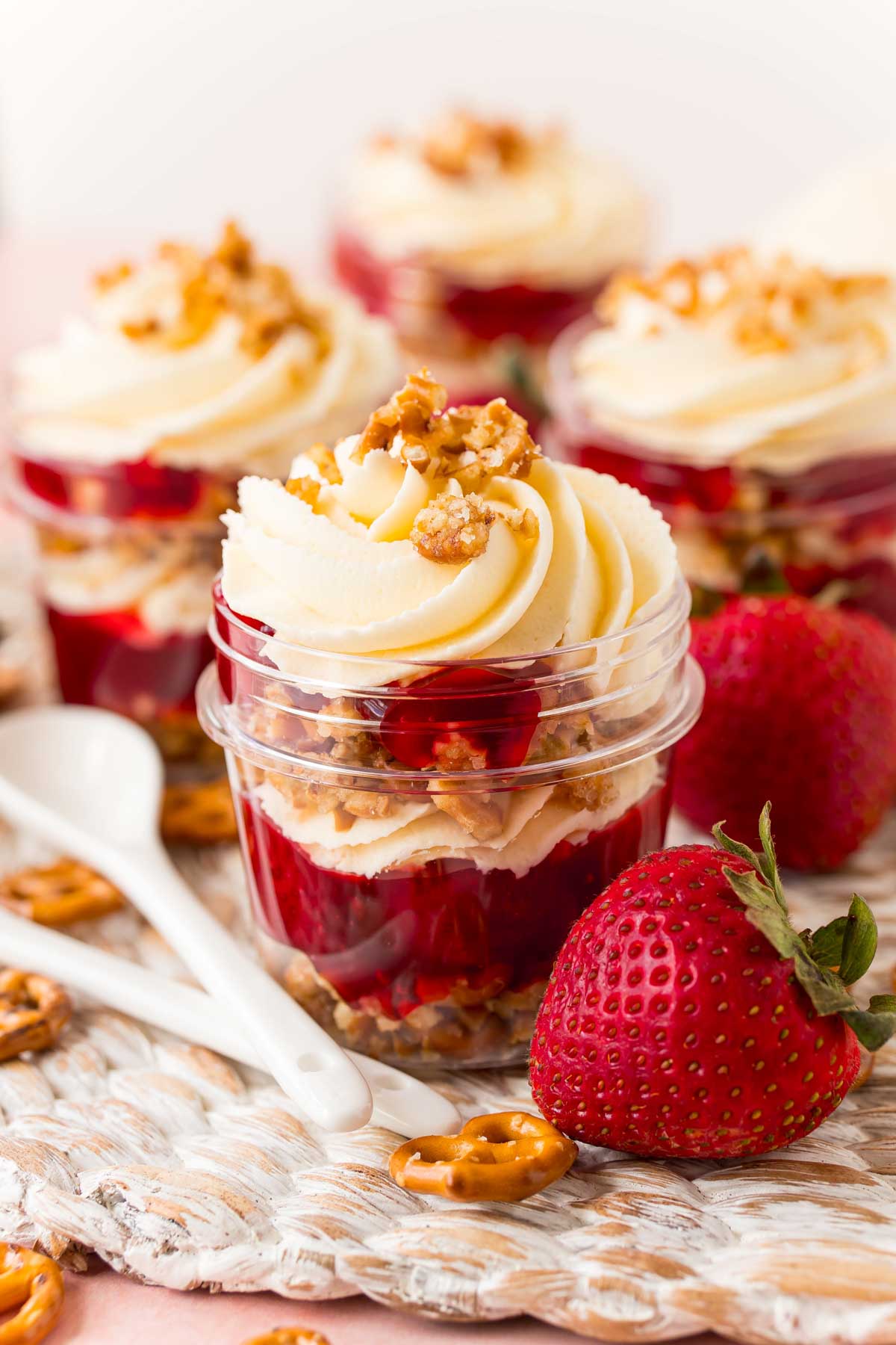 individual strawberry pretzel salad in a jar