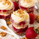 individual strawberry pretzel salad with a spoon