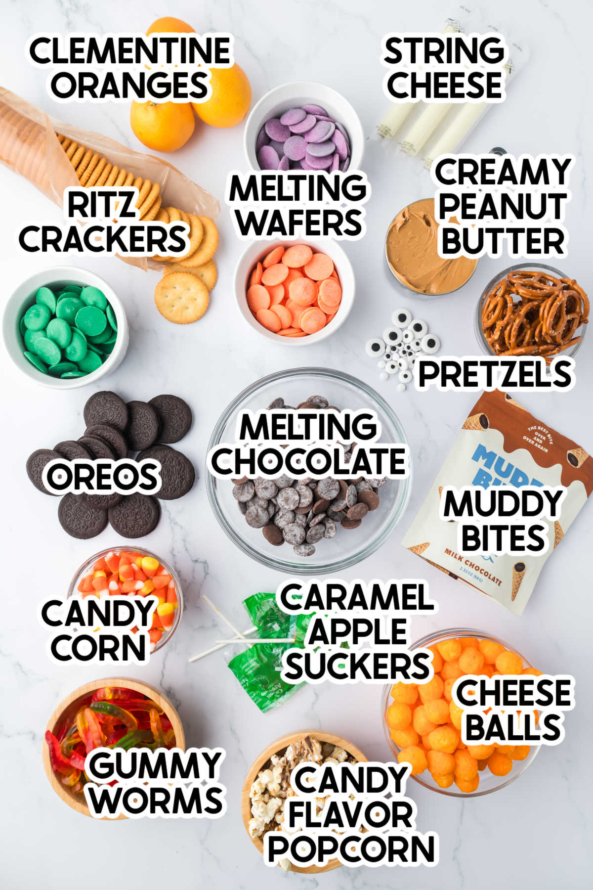 ingredients to make a Halloween snack board with labels
