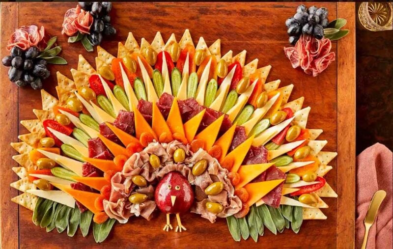 red apple turkey with cheese and meat feathers