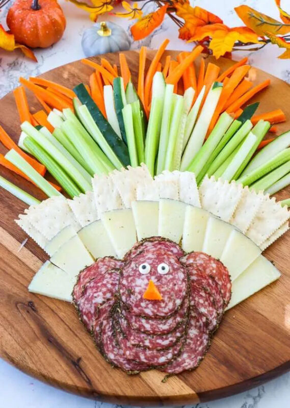 meat turkey with cheese and vegetable feathers