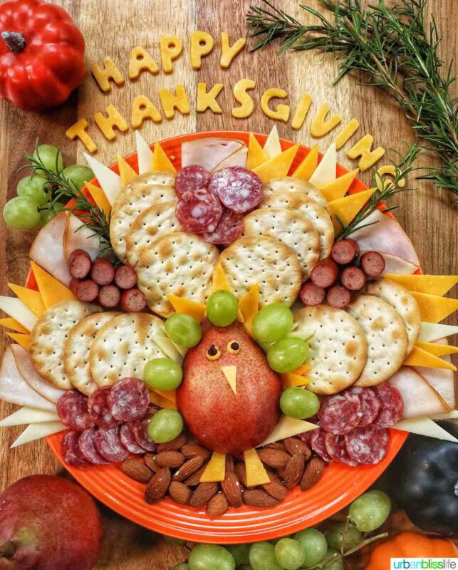 fruit turkey with cracker and cheese feathers