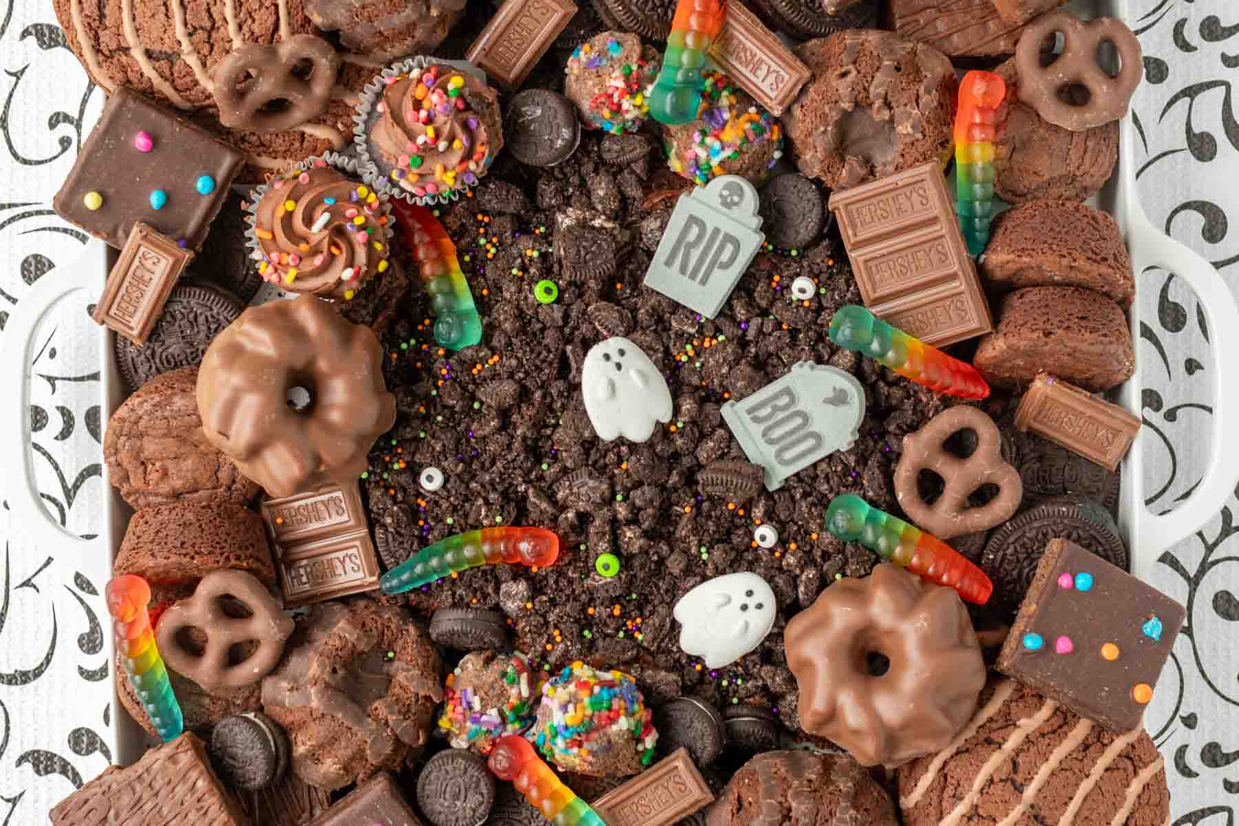 close up of a Halloween frosting board with dirt