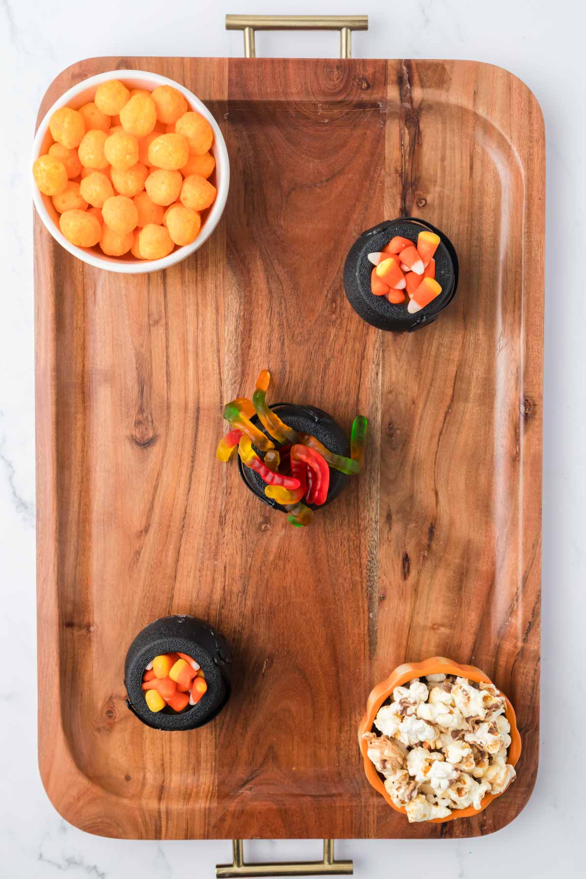 small bowls on a snack board