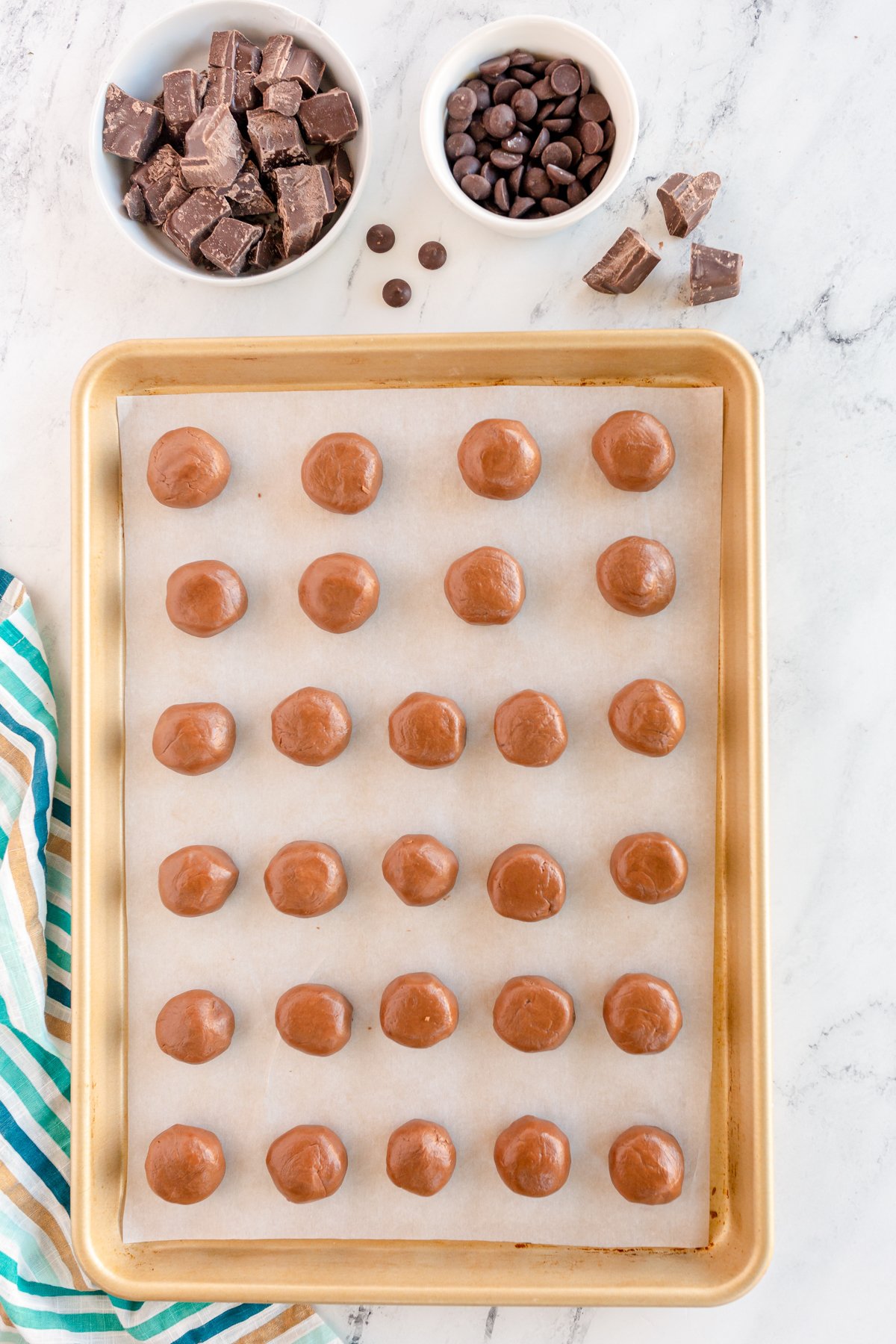 rolled out buckeyes on a baking sheet