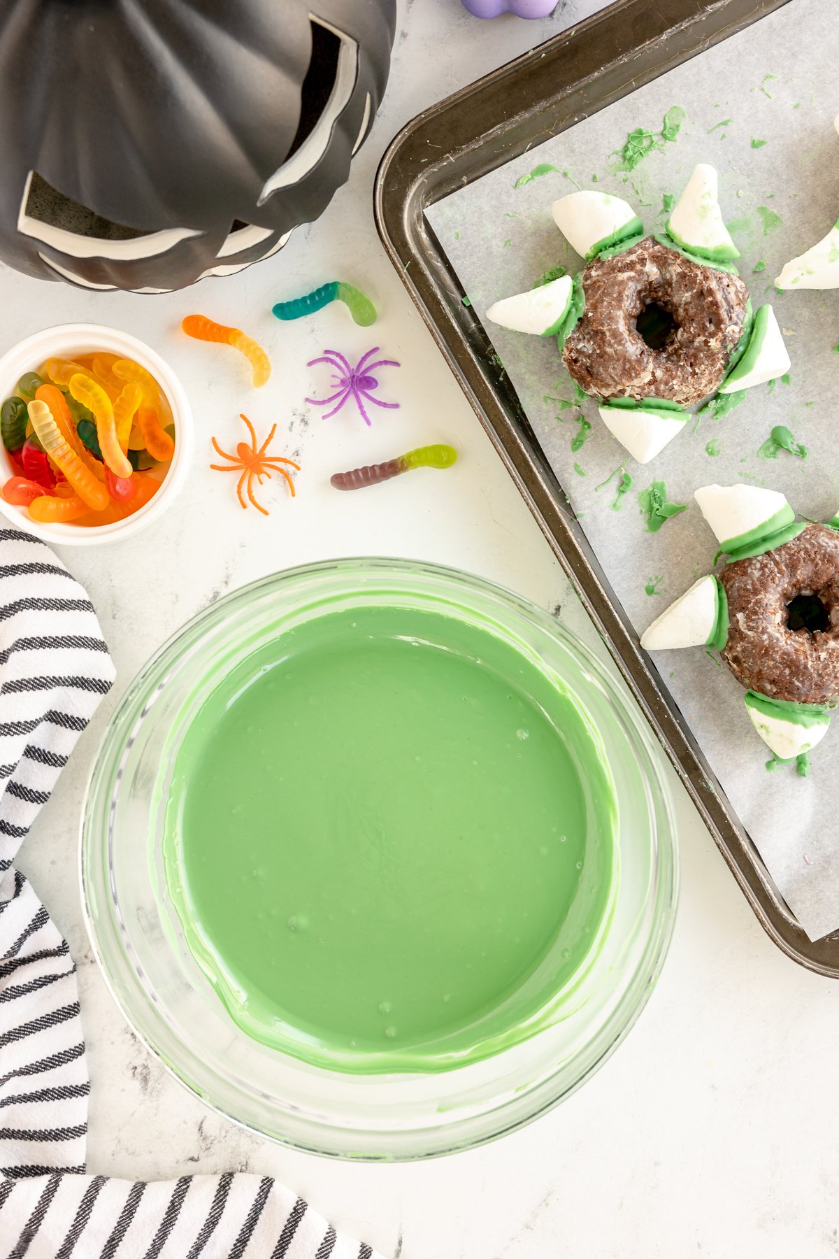 glass bowl with melted green candy melts in it