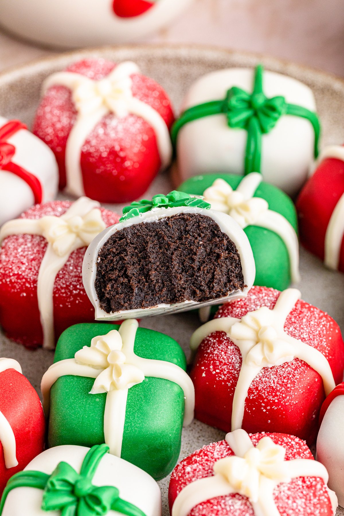 pile of Christmas Oreo balls that look like presents