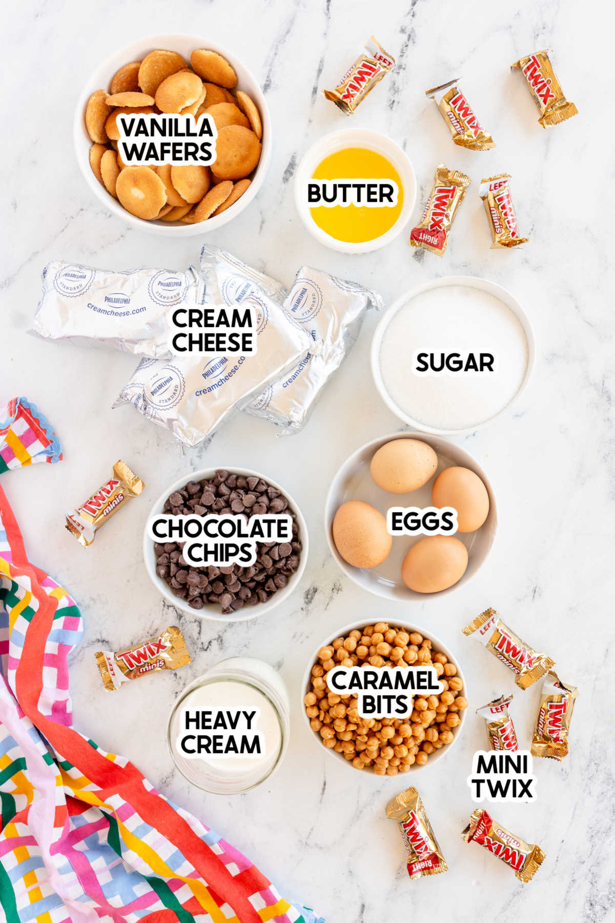 ingredients to make twix cheesecake with labels