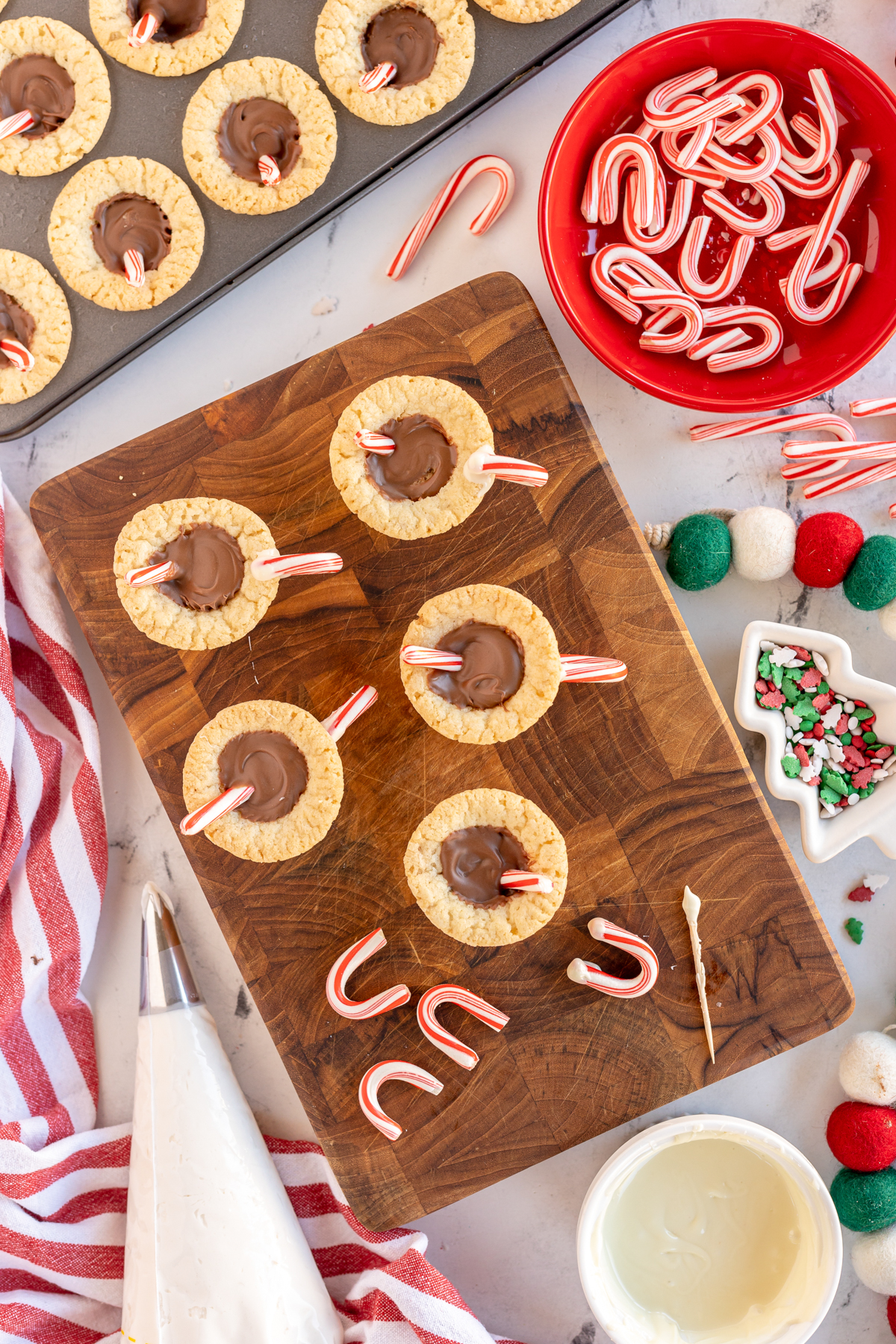 hot chocolate cookie cups with candy cane handles