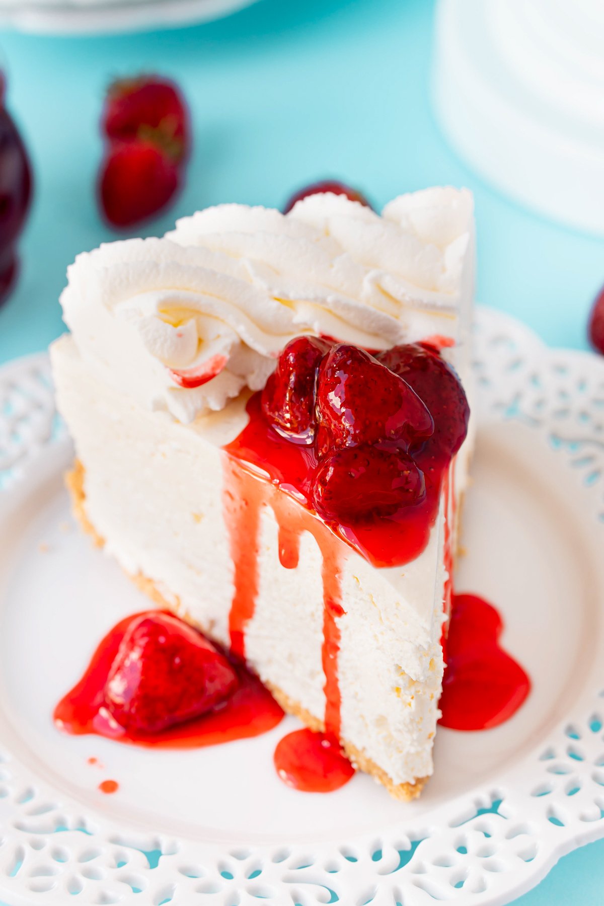 slice of no bake cheesecake with strawberries on top