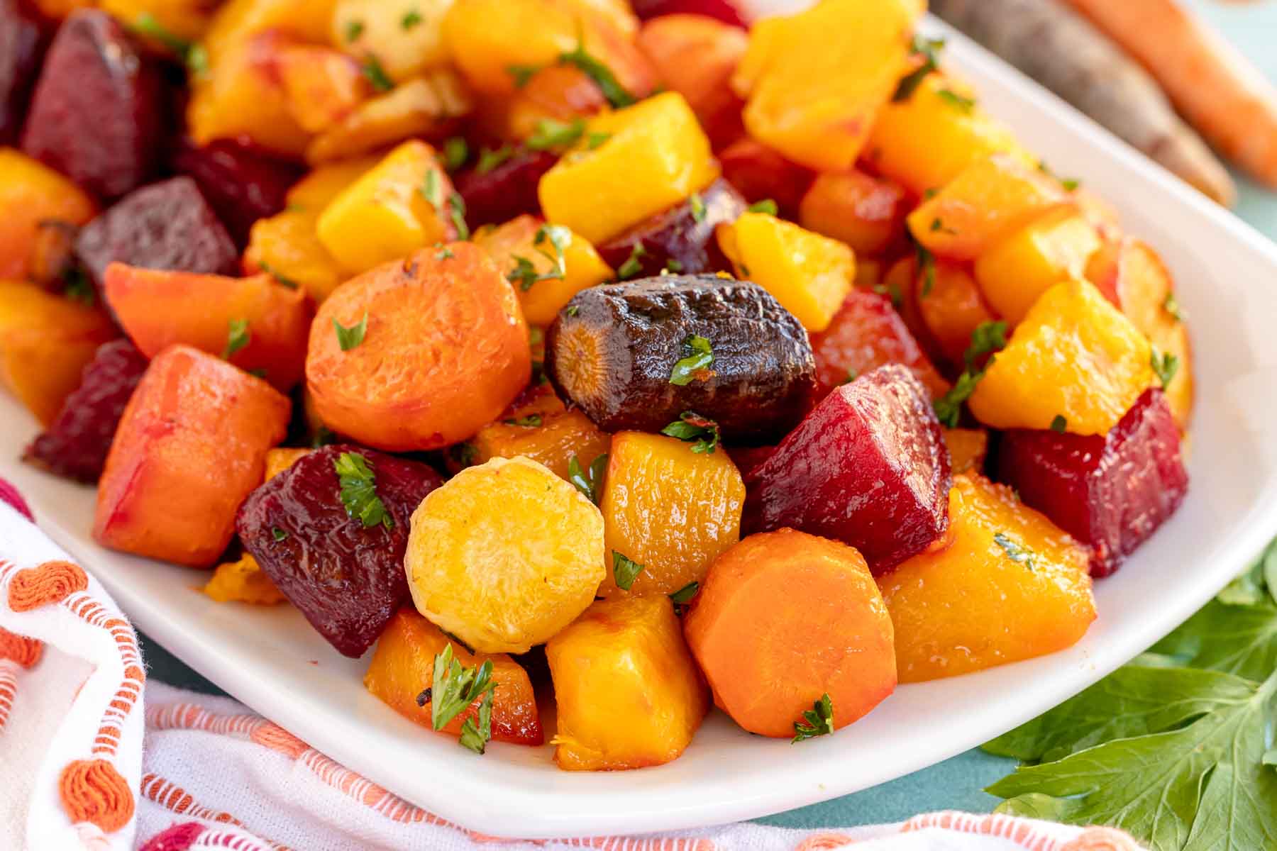 https://www.playpartyplan.com/wp-content/uploads/2023/11/roasted-root-vegetables-13.jpg